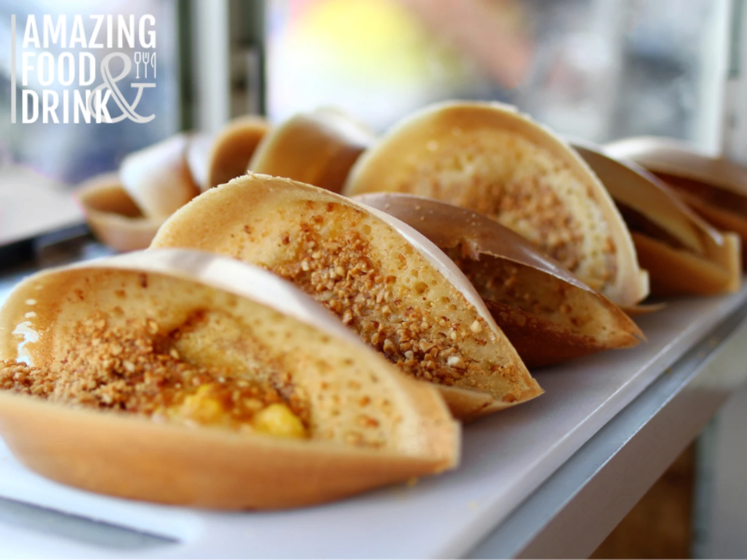 Apam balik, another version of pancake, sweet crispy filled with peanuts, sugar and sweet corn. Delicious Malay street food, Malaysian snack, Asian cuisine.

