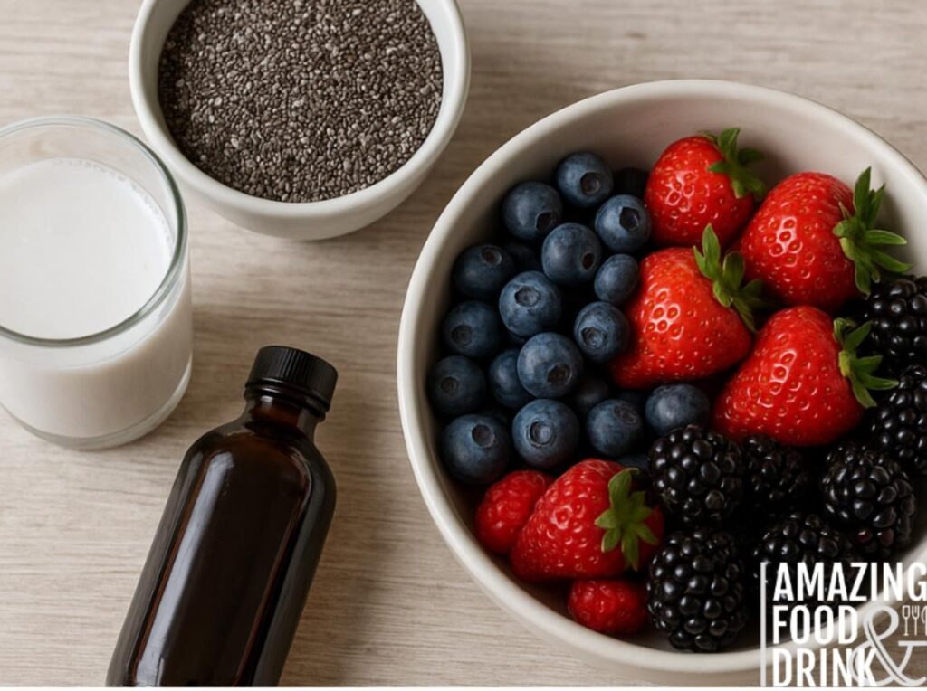 "A top-down view of fresh ingredients on a wooden surface, including a bowl of organic chia seeds, a glass of coconut milk, a small bottle of vanilla extract, and a bowl of mixed berries such as strawberries, blueberries, raspberries, and blackberries."







